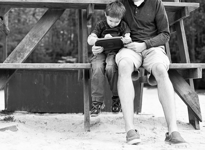 boy and dad on lifeguard chair