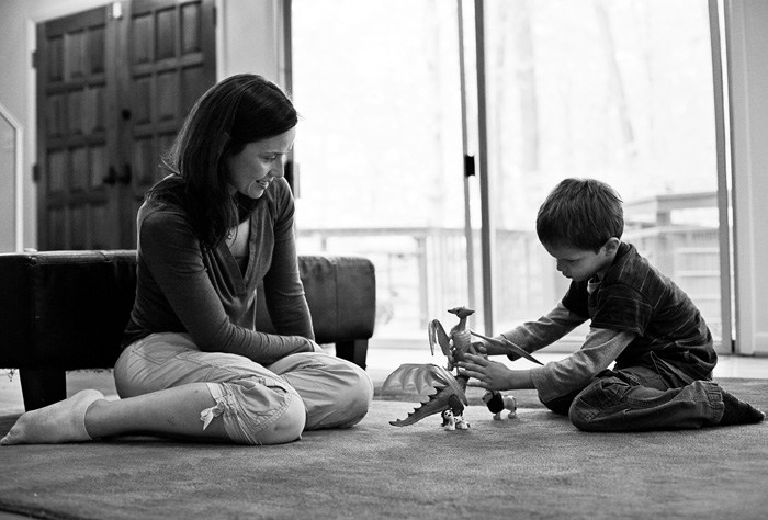 mom and son playing with dinos