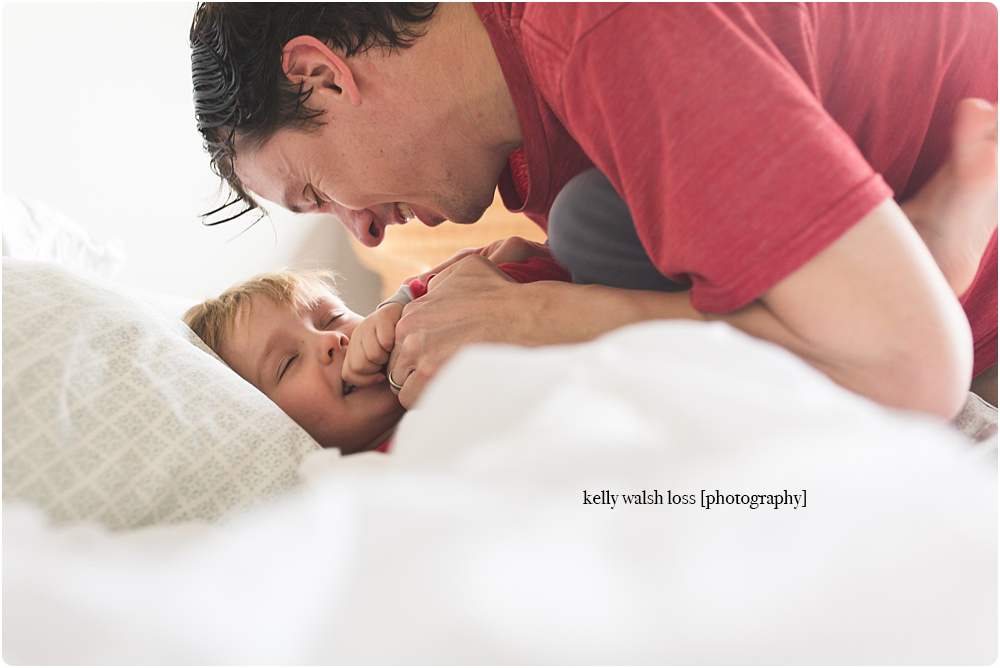 dad and son tickling