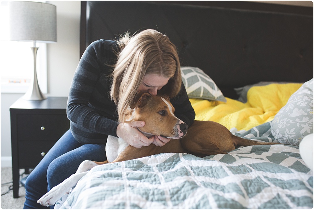 lady kissing dog