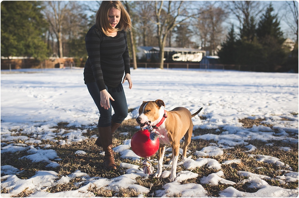 pregnant lady running with dog
