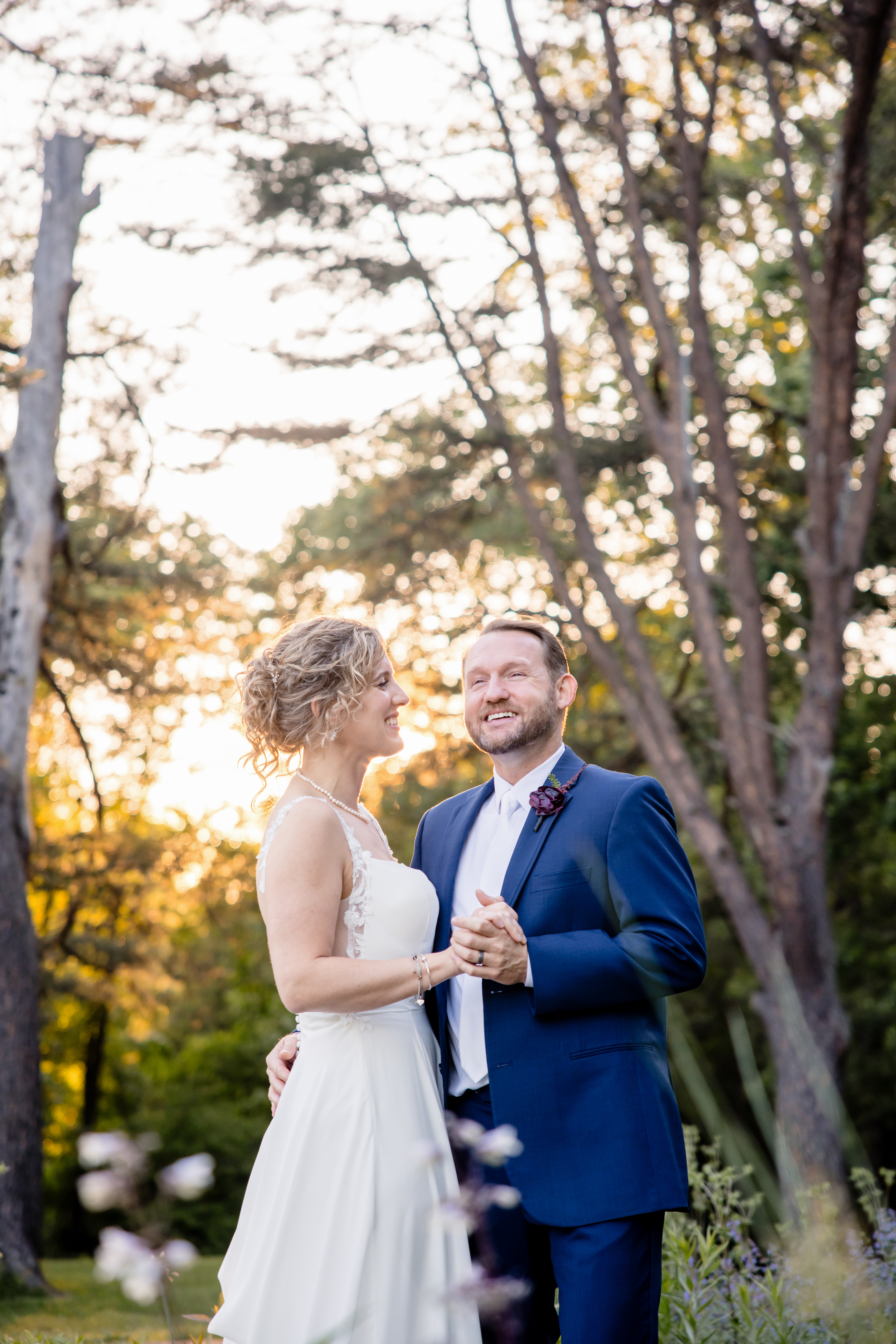 a couple taking couple wedding portraits at the Meadowlark Botanical Gardens 
